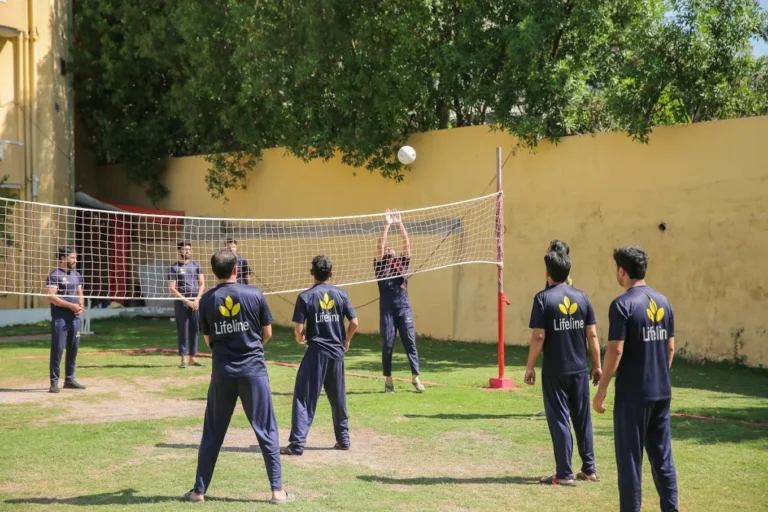 Patients playing badminton at Lifeline, the best rehab center in Islamabad.